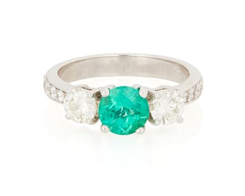 An 18K White Gold, Emerald and Diamond Ring
