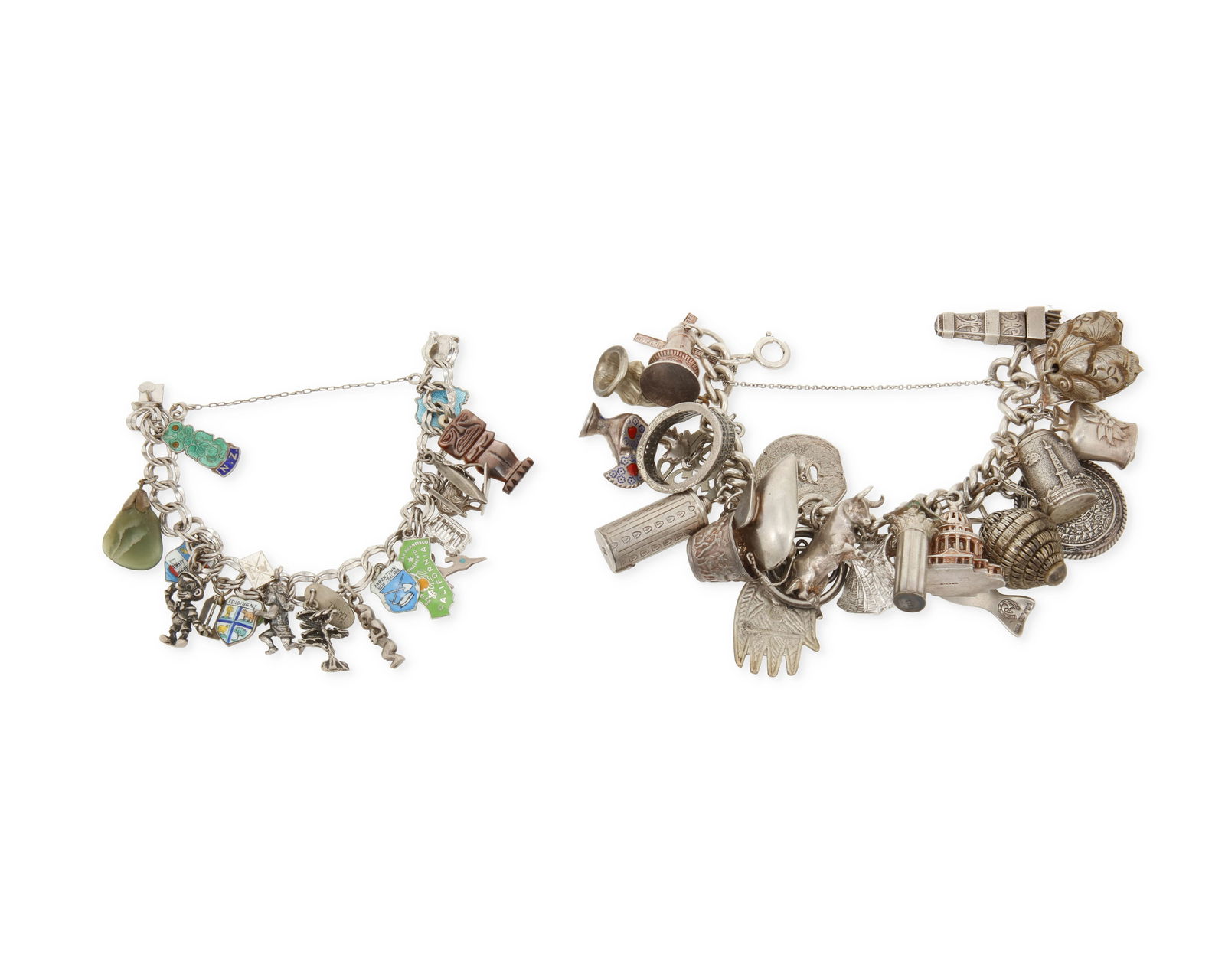 Two Sterling Silver Charm Bracelets: Two Sterling Silver Charm BraceletsComprising a chunky sterling silver chain bracelet with multiple sterling souvenir and auspicious charms including the Colosseum, the Bocca della Verita in Rome, a w