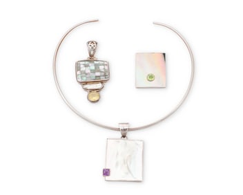 A Group of Silver and Shell Pendants