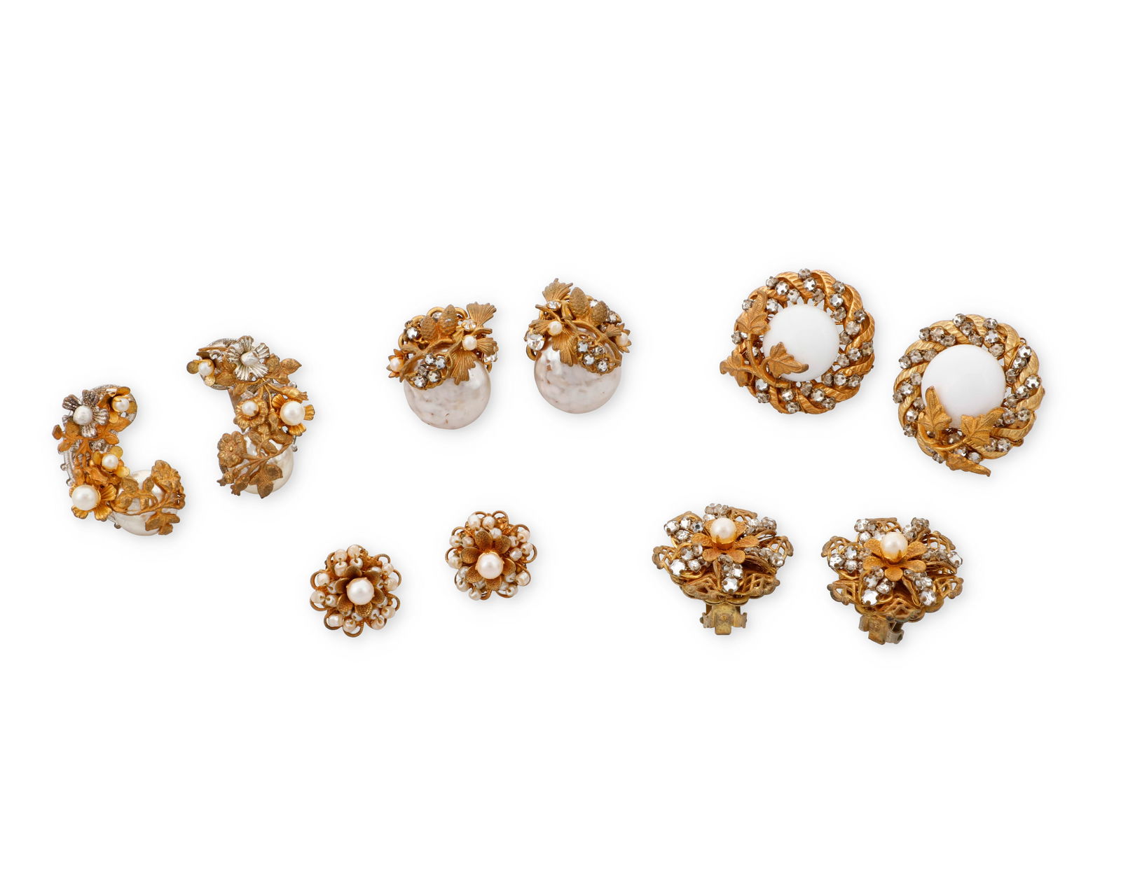 Miriam Haskell: A Group of Vintage Earrings: Miriam Haskell: A Group of Vintage EarringsFeaturing four pairs of Miriam Haskell clip earrings in various sizes and motifs including flowers, leaves, and pine cones, as well as a pair of similar styl