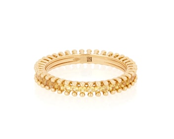An 18K Gold and Yellow Sapphire Ring