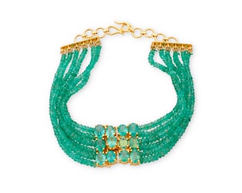An 18K Gold and Emerald Bracelet