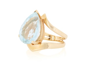 A Gold and Blue Topaz Ring