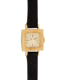 Bucherer: An 18K Gold Watch