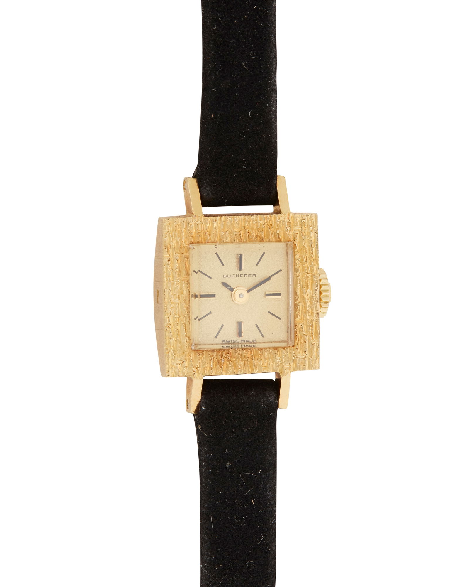 Bucherer: An 18K Gold Watch: Bucherer: An 18K Gold WatchDial:10.00 mm, square with baton hour markersCase: 15.50 mmClosure: black suede strap with gold plated buckle claspSigned: dialInner circumference: 6 - 7in.12.8 grams gross