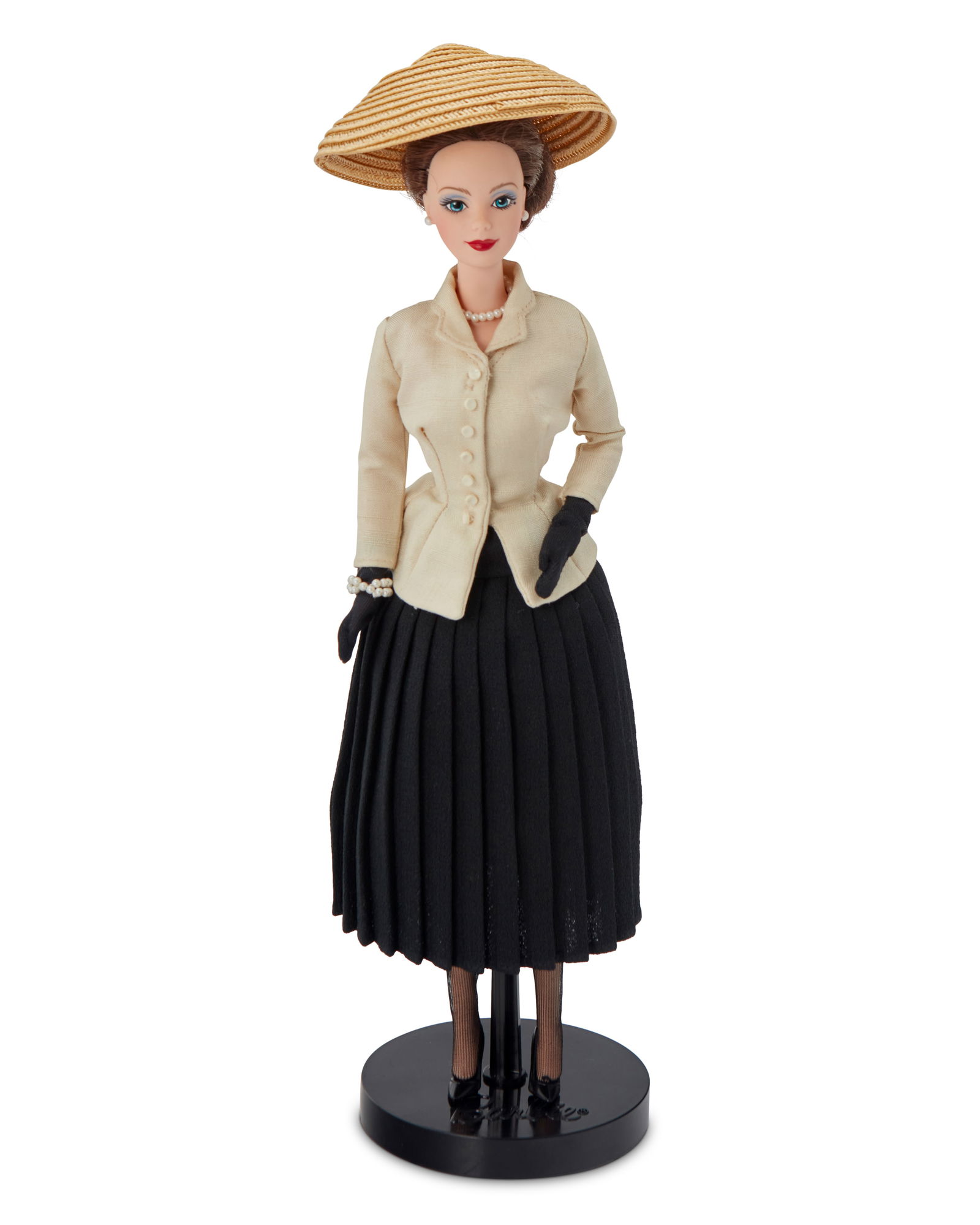 Christian Dior Limited Edition 50th Anniversary 1947 "New Look" Barbie Doll: Christian Dior Limited Edition 50th Anniversary 1947 "New Look" Barbie DollCirca 1996/1997; Mattel, Inc.; with Christian Dior tag to skirt interior: © 1995A licensed reproduction featuring a brunette