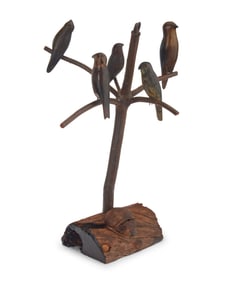A Folk Art carved wood bird figural group