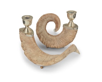 A near pair of ram's horn candlesticks