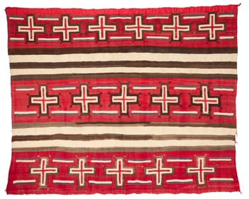 A Navajo wearing blanket variant with spider woman crosses
