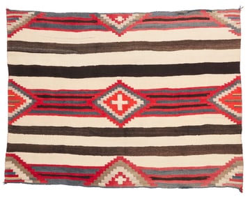 A Navajo Third Phase Transitional wearing blanket