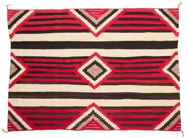 A Navajo Third Phase Revival wearing blanket