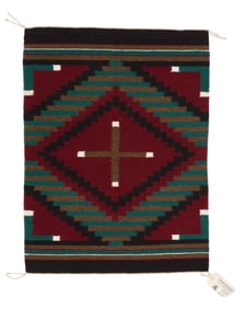 A Mazie Begay Navajo weaving