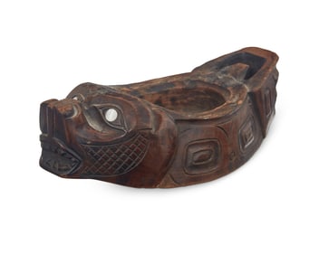 A Northwest Coast carved cedar grease bowl