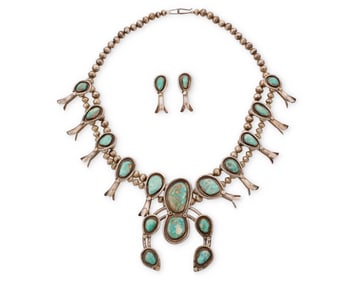 A set of Southwest sterling silver and turquoise squash blossom jewelry