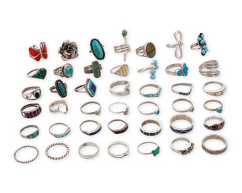 A group of Southwest-style silver and stone set rings