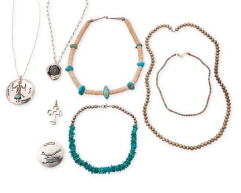 A group of Southwest-style silver and turquoise jewelry