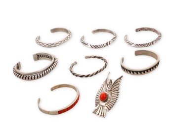 A group of Southwest sterling silver and set coral jewelry
