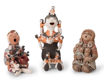Three Southwest pottery storyteller figures