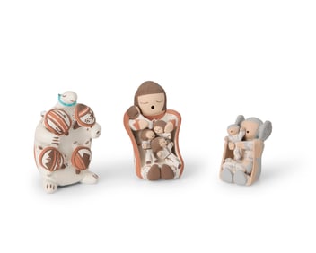 A group of Isleta Pueblo storyteller pottery figures