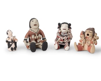 A group of Southwest Pueblo pottery storytellers