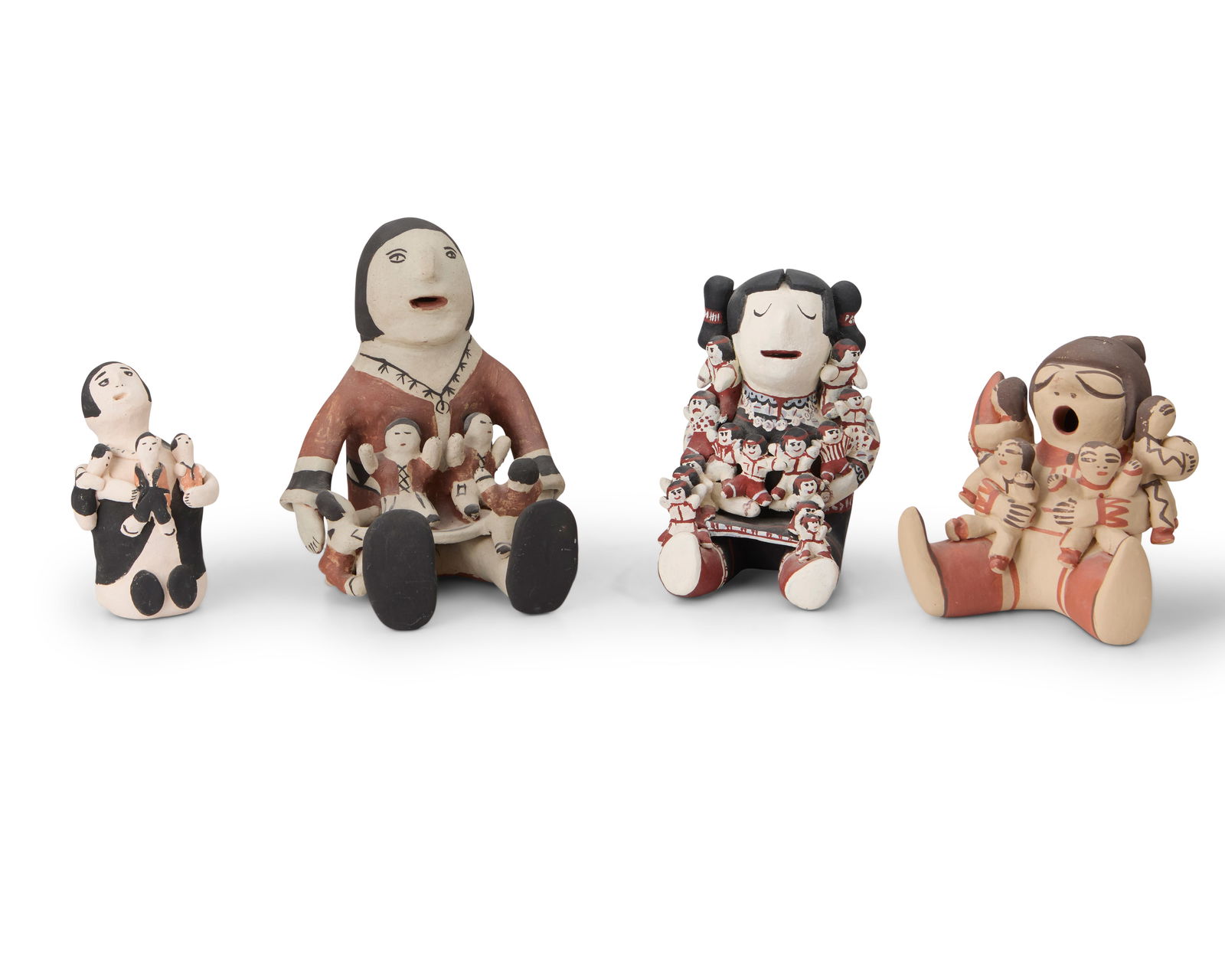 A group of Southwest Pueblo pottery storytellers: A group of Southwest Pueblo pottery storytellersLate 20th/21st centuryTwo variously signed to base: MQ / [illegible] Cochiti N.M.Four polychrome pottery storytellers in red, black and white in various