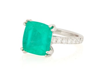 A Platinum, Emerald and Diamond Ring