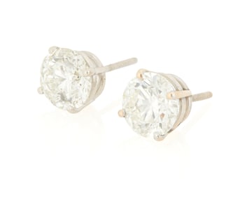 A Pair of 14K White Gold and Diamond Stud Earrings