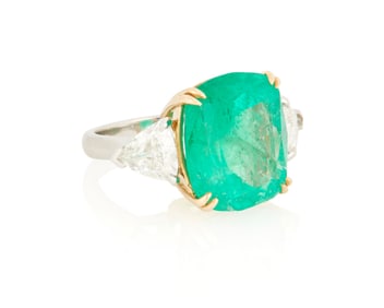 A Platinum, 18K Gold, Emerald and Diamond Ring