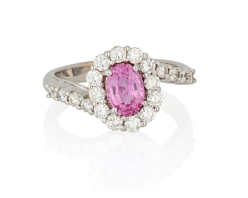 An 18K White Gold, Pink Sapphire and Diamond Ring