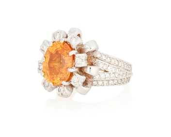 An 18K White Gold, Mandarin Garnet and Diamond Ring