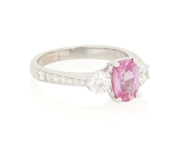 An 18K White Gold, Pink Sapphire and Diamond Ring