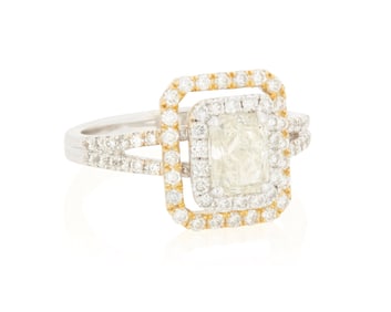 An 18K Bi-Color Gold, Colored Diamond and Diamond Ring