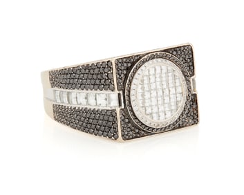 An 18K White Gold, Black Diamond and Diamond Ring