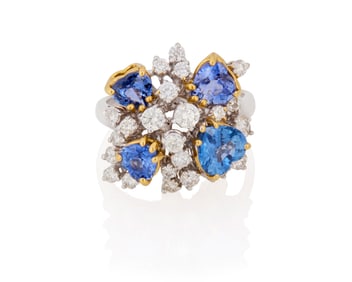 An 18K Bi-Color Gold, Sapphire and Diamond Ring