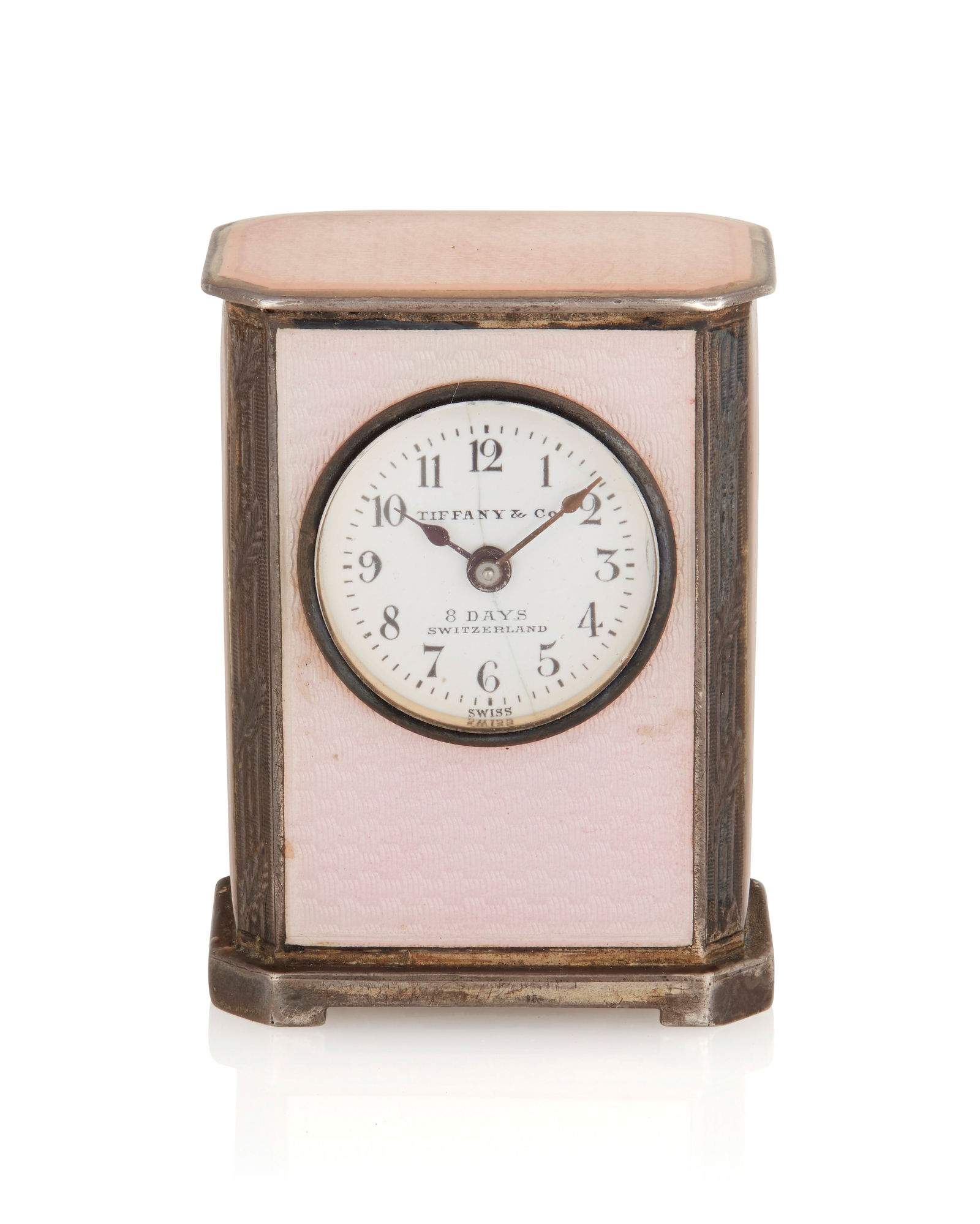 Tiffany & Co.: A Sterling Silver and Guilloche Enamel Travel Clock: Tiffany & Co.: A Sterling Silver and Guilloche Enamel Travel ClockFeaturing a round diamond with Arabic hour markers, signed Tiffany & Co., 8 Days Switzerland, set in a rectangular standing frame acce