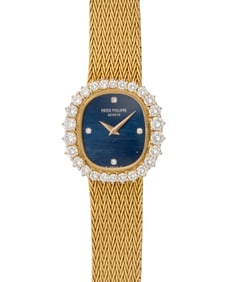 Patek Philippe: An 18K Gold and Diamond Watch