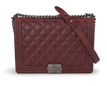 CHANEL: A Large Burgundy Leather Crossbody Boy Flap Bag, 2013