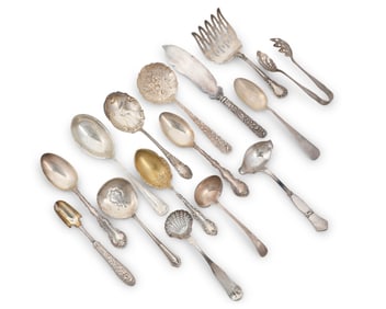 A group of sterling silver serving utensils