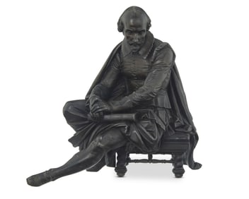 A cast metal sculpture of William Shakespeare