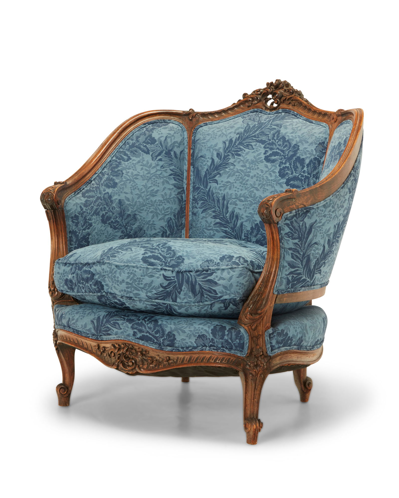 A Louis XV-style carved walnut bergere (1 of 7)