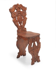An Italian Renaissance-style carved wood sgabello chair