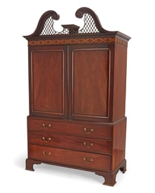 A George III Chippendale-style mahogany linen press