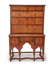 A William & Mary walnut chest on stand