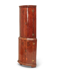 A Continental corner cabinet
