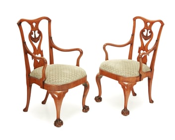 A pair of George II-style upholstered chairs