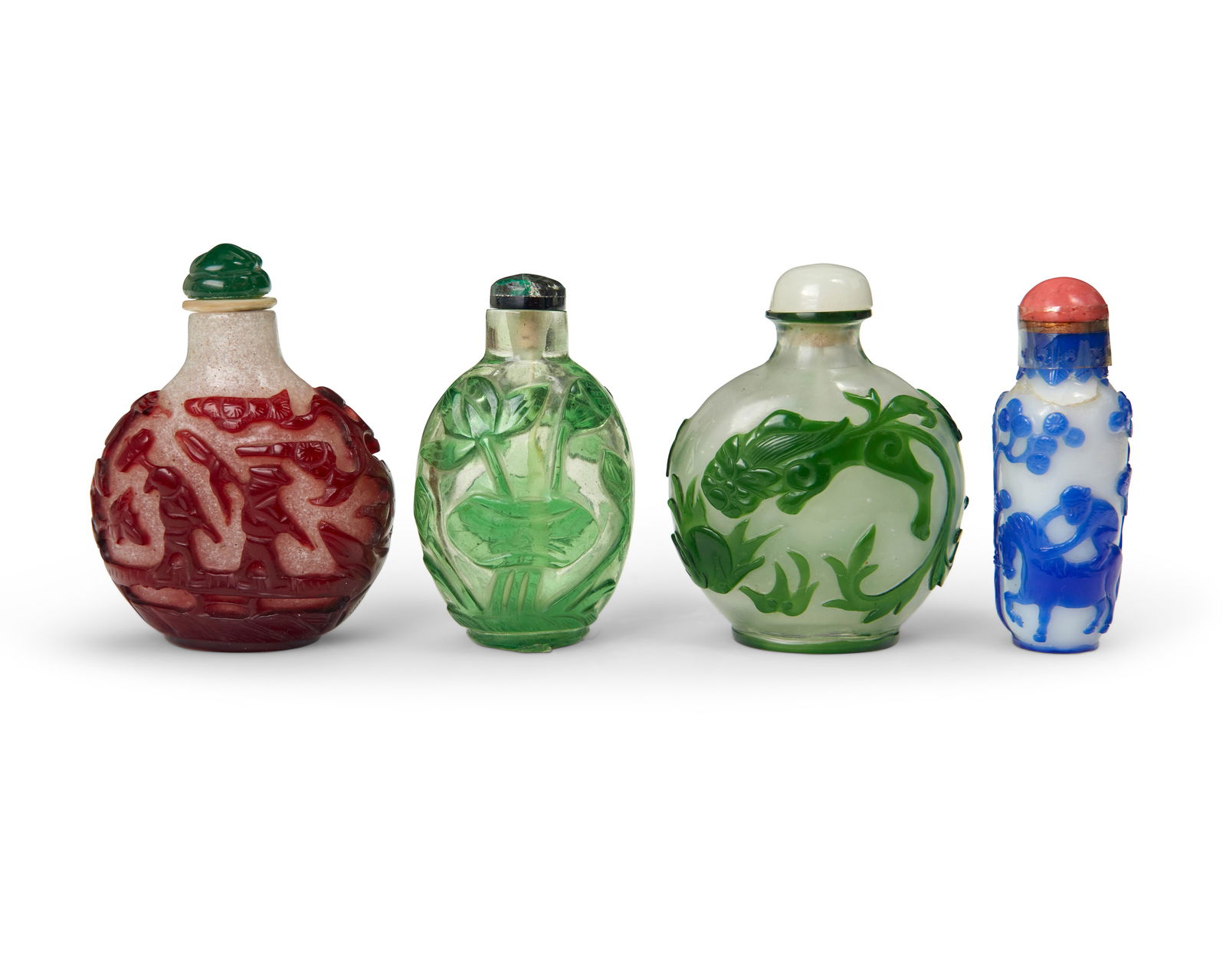 Four Chinese overlay glass snuff bottles (1 of 5)