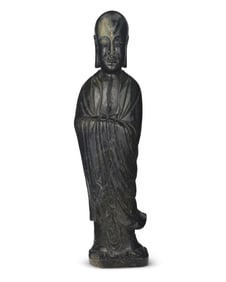 A large Chinese carved nephrite figure of an Arhat