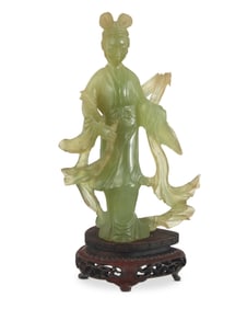 A Chinese carved jade figure of a beauty
