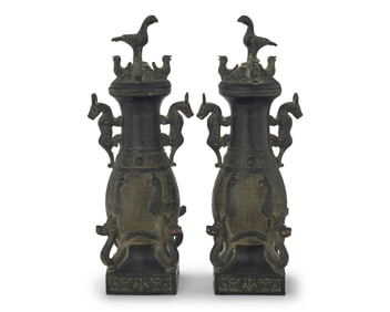 A pair of Chinese archaistic-style metal covered urns