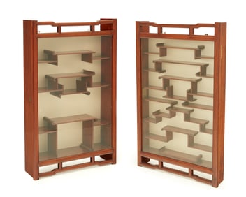 Two chinoiserie hardwood wall-mounted display cabinets
